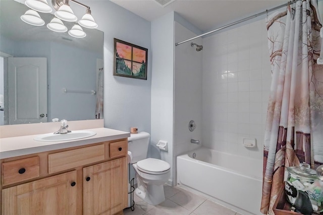 full bathroom with shower / bath combo, vanity, an inviting chandelier, tile patterned flooring, and toilet