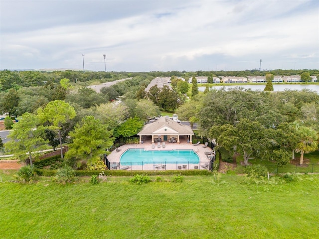 view of pool featuring a yard and a patio area