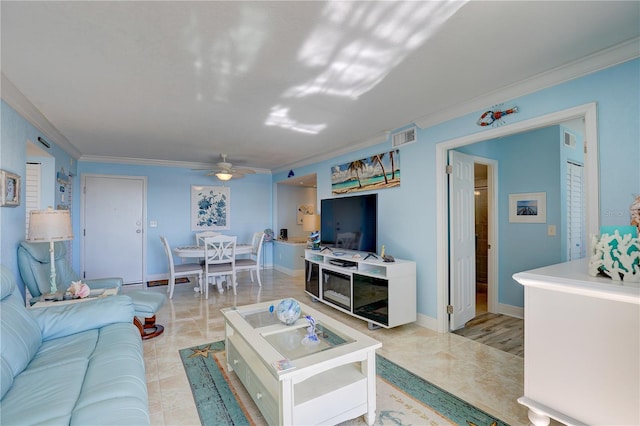 living room featuring ceiling fan and crown molding