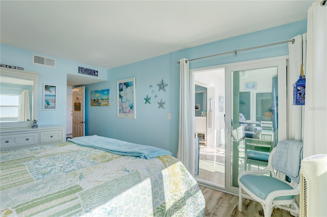 bedroom featuring light hardwood / wood-style floors