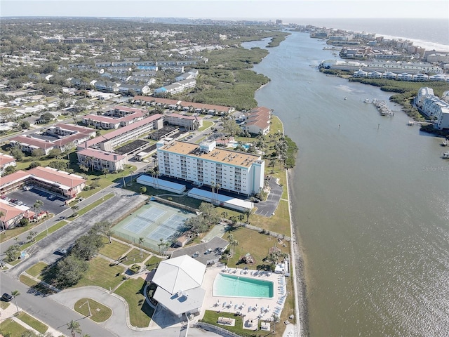 birds eye view of property featuring a water view