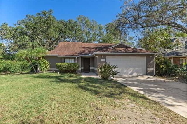 single story home featuring a front yard and a garage