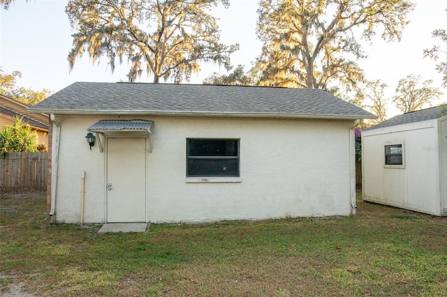 view of outdoor structure with a yard