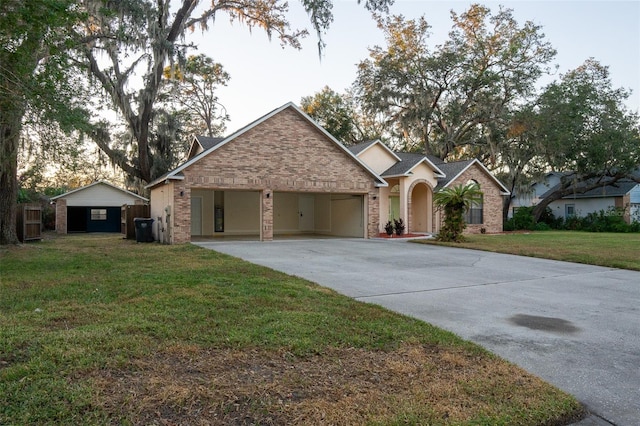 single story home featuring a front yard