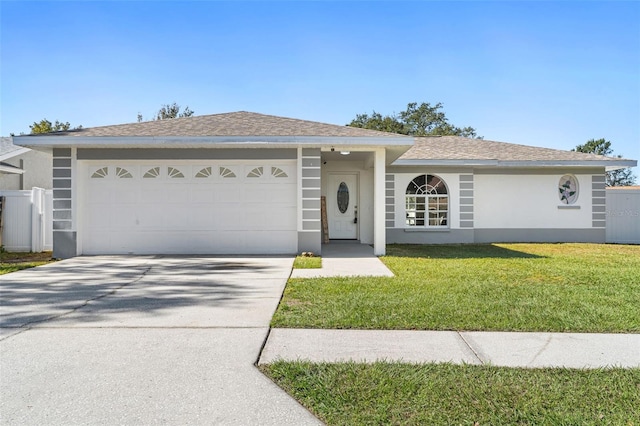 ranch-style home with a front yard and a garage