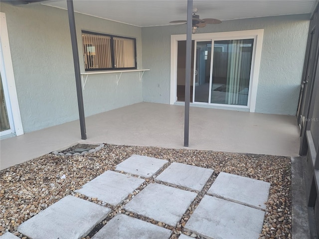 view of patio with ceiling fan