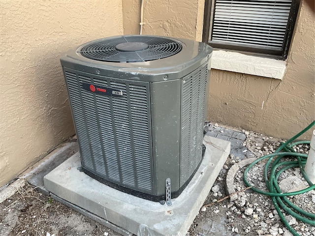 exterior details featuring cooling unit