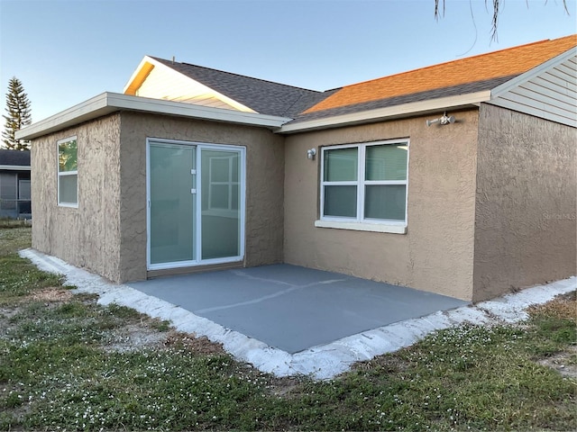 rear view of house with a patio area