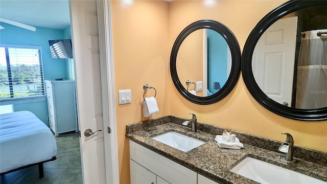 1515 Pinellas Bayway S Unit 35, Tierra Verde, FL 33715 - full bathroom with double vanity and tile patterned floors
