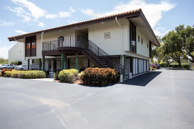 1515 Pinellas Bayway S Unit 35, Tierra Verde, FL 33715 - view of property featuring stairs