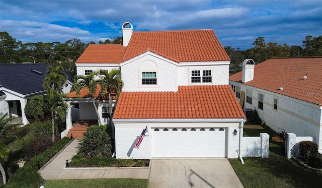 view of front of property featuring a garage