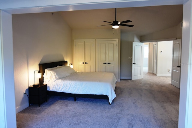 bedroom featuring ceiling fan, light carpet, and lofted ceiling