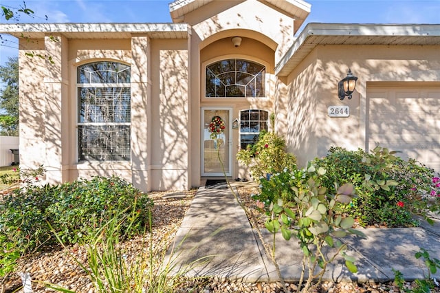 property entrance featuring a garage