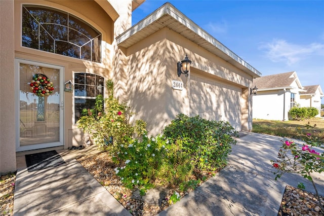 property entrance with a garage