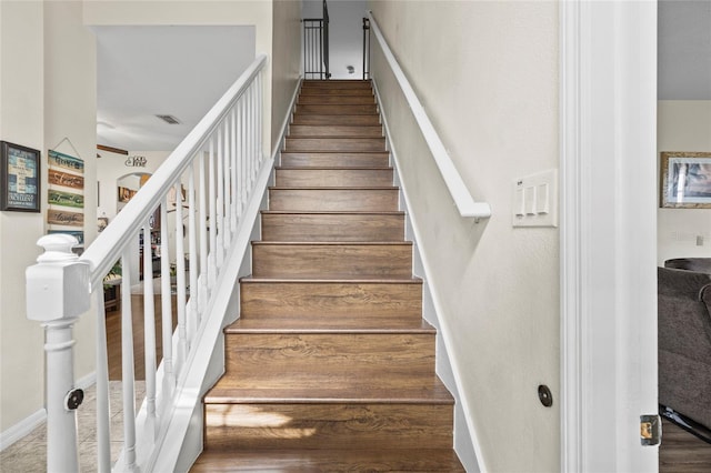 staircase with baseboards