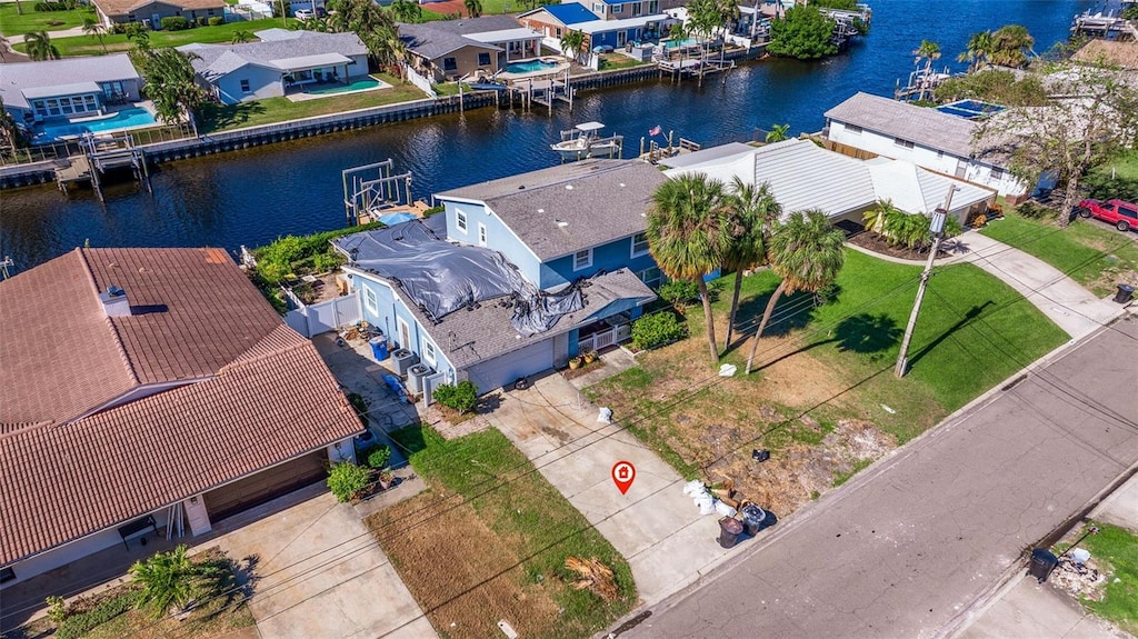 bird's eye view with a water view