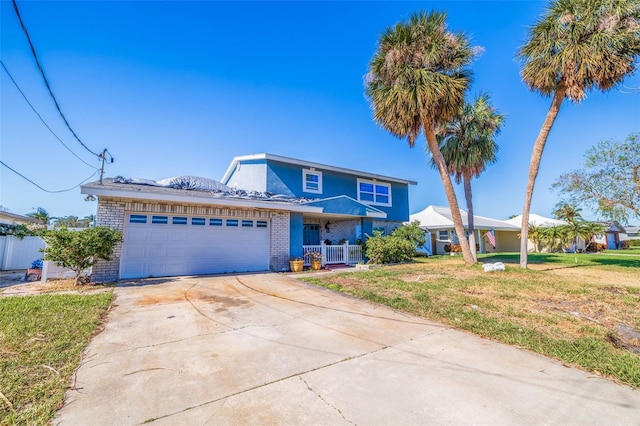 view of front of house with a garage and a front yard