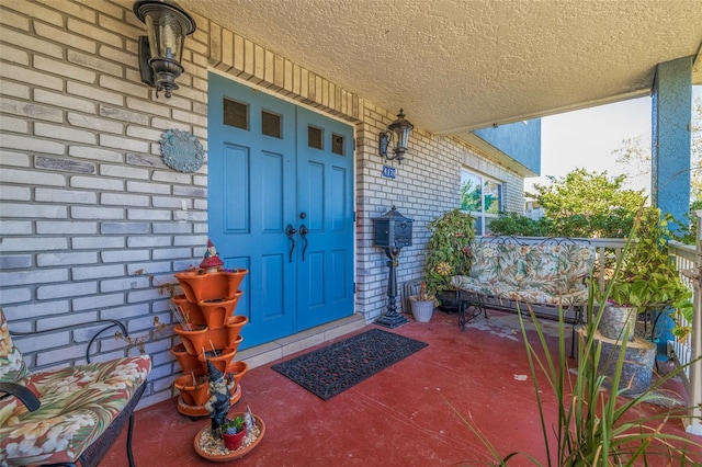 entrance to property with covered porch