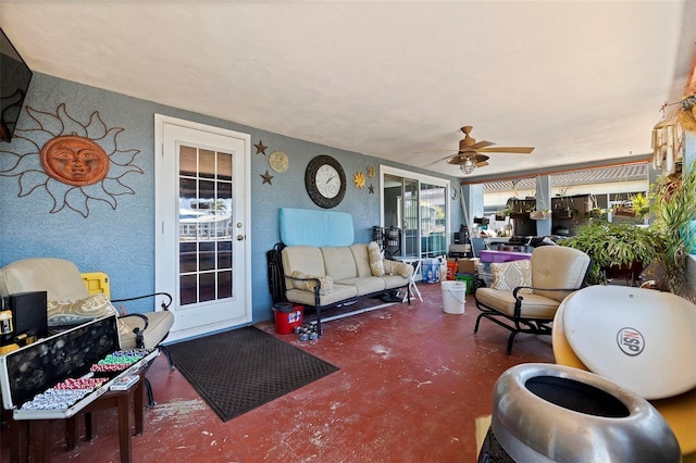 view of patio / terrace with ceiling fan and an outdoor hangout area