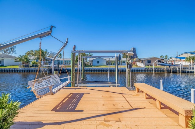 view of dock with a water view