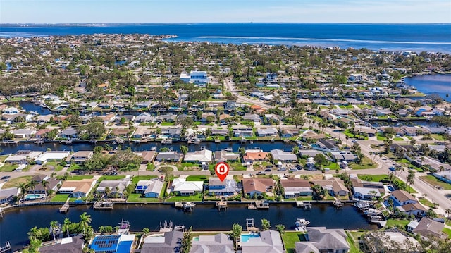 drone / aerial view featuring a water view