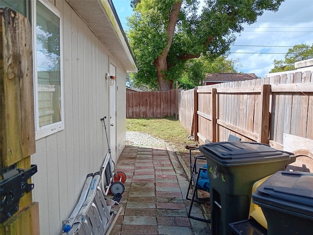 7045 Lenox Dr, New Port Richey, FL 34653 - fenced backyard with a grill