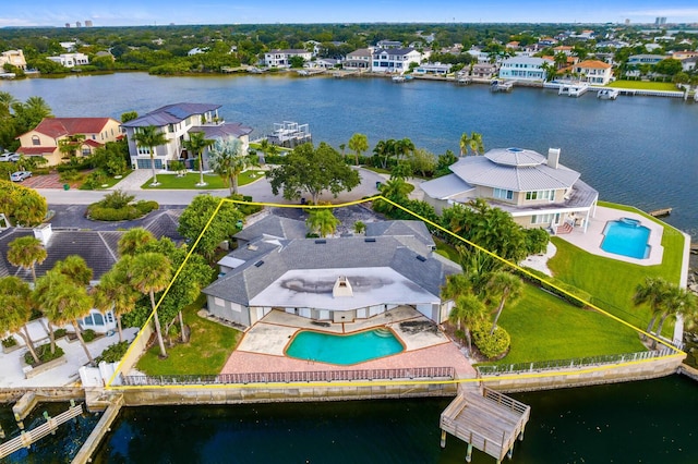 birds eye view of property featuring a water view