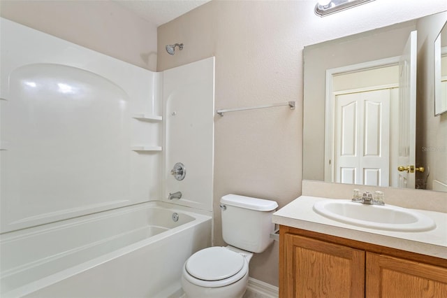 full bathroom featuring toilet, vanity, and washtub / shower combination