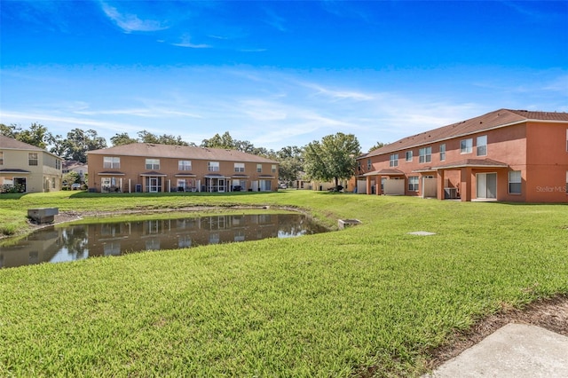 view of yard with a water view