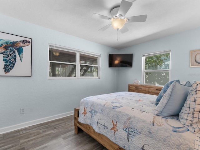 bedroom featuring wood-type flooring and ceiling fan