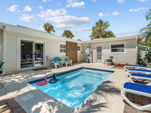 view of swimming pool featuring a patio