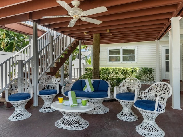 view of patio featuring ceiling fan and an outdoor living space