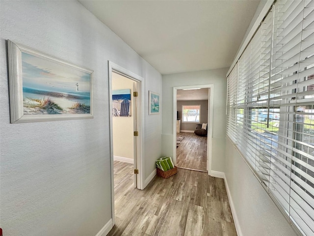 hallway featuring light wood-type flooring