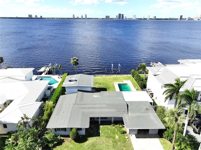 bird's eye view with a water view