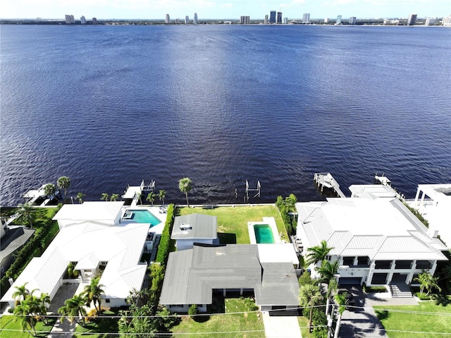 drone / aerial view with a water view