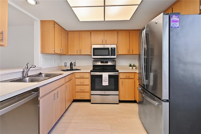 2122 Hereford Dr Unit 511, Sun City Center, FL 33573 - kitchen featuring appliances with stainless steel finishes, a sink, light countertops, and light brown cabinets