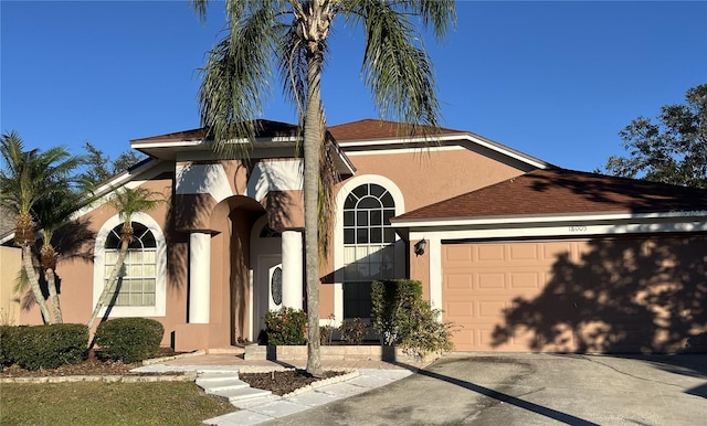 view of front of home with a garage