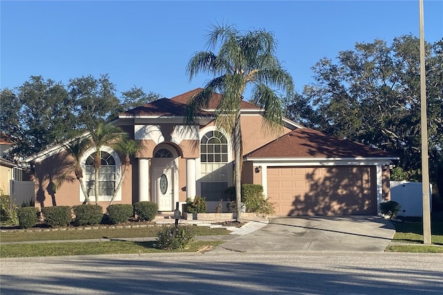 view of front of home with a garage