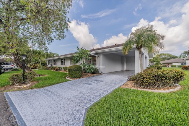 ranch-style house with a front yard and a carport