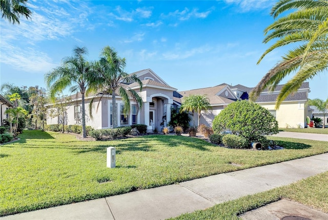 view of front facade with a front yard