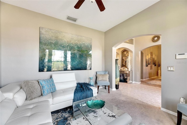 living room with carpet flooring and ceiling fan