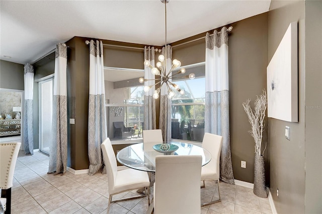 tiled dining area with a notable chandelier