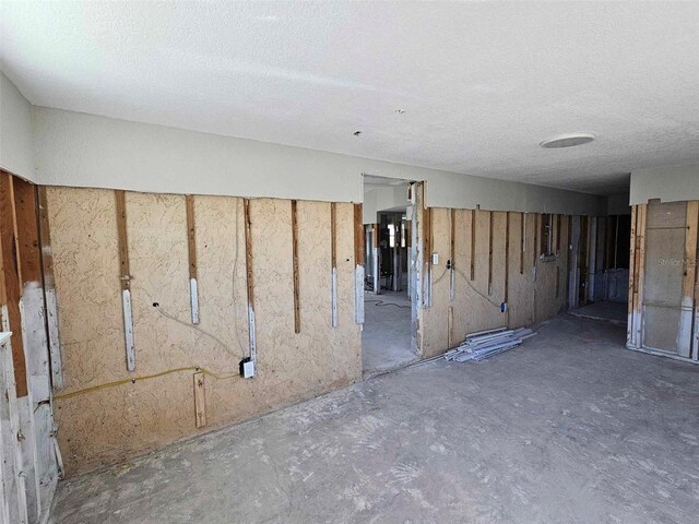 basement with a textured ceiling