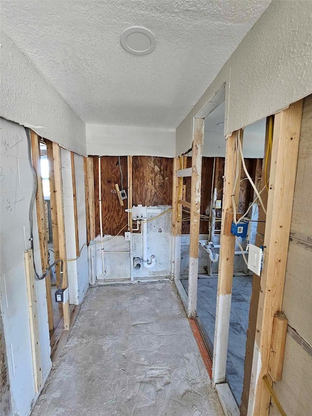 interior space with a textured ceiling