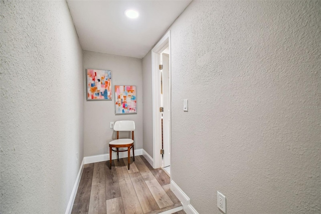 hall featuring hardwood / wood-style flooring