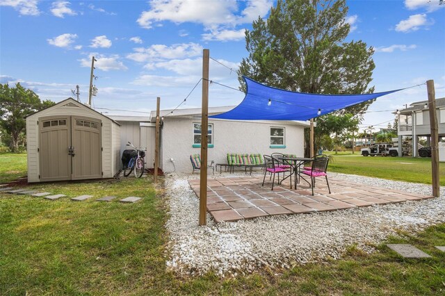 view of patio / terrace featuring a shed