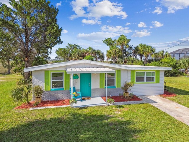 ranch-style house with a front yard