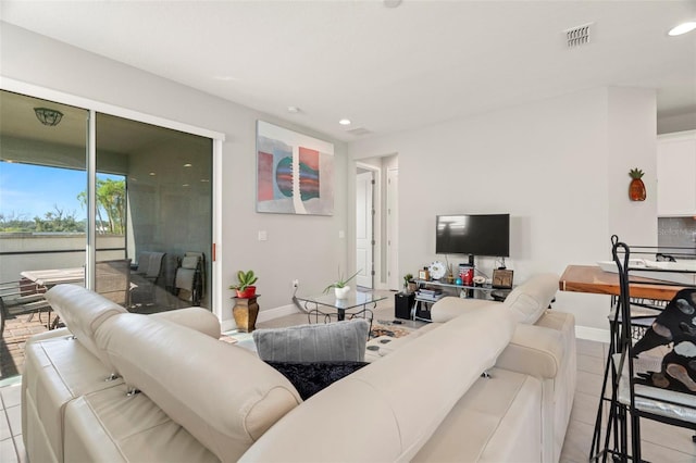 living room featuring light tile patterned floors