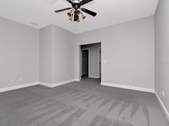 empty room featuring carpet and ceiling fan