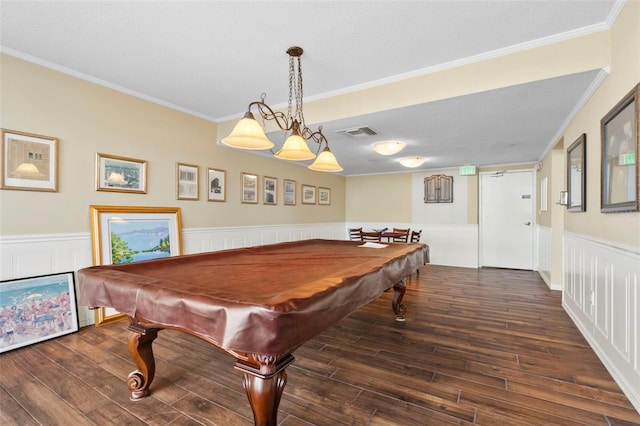 playroom with a textured ceiling, dark hardwood / wood-style floors, crown molding, and billiards